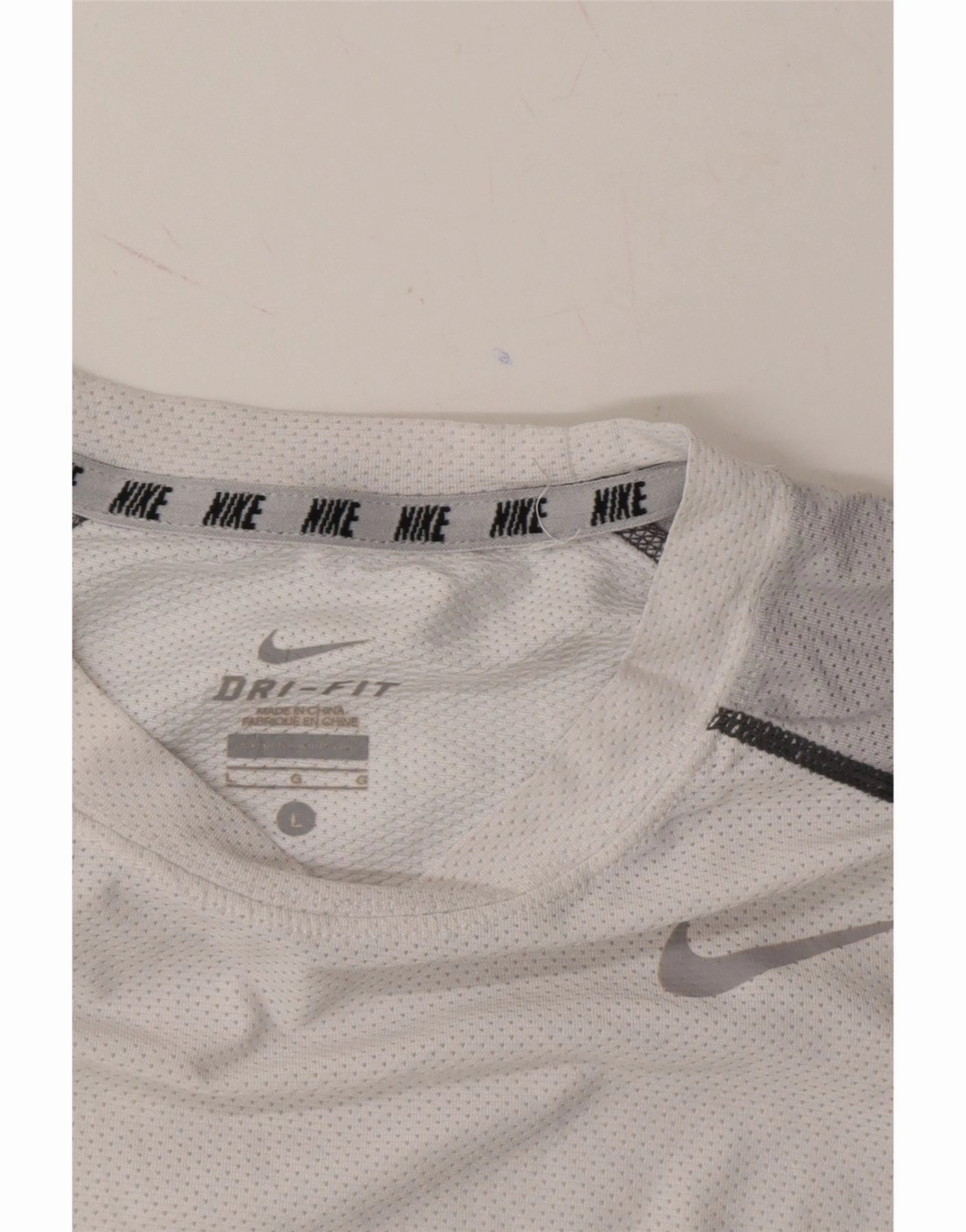 NIKE Boys Dri Fit Top Long Sleeve 12-13 Years Large White Colourblock